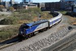 RNCX 105 leads train P075-08 past the signal at Raleigh Tower